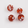 Round handmade glass bead 15mm amber with white flower