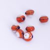 Handmade glass beads with trails 12x13mm Orange