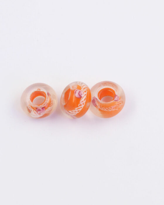 Large hole glass bead orange with pink flower
