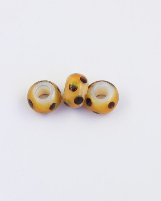 Large hole glass bead amber with poke dots