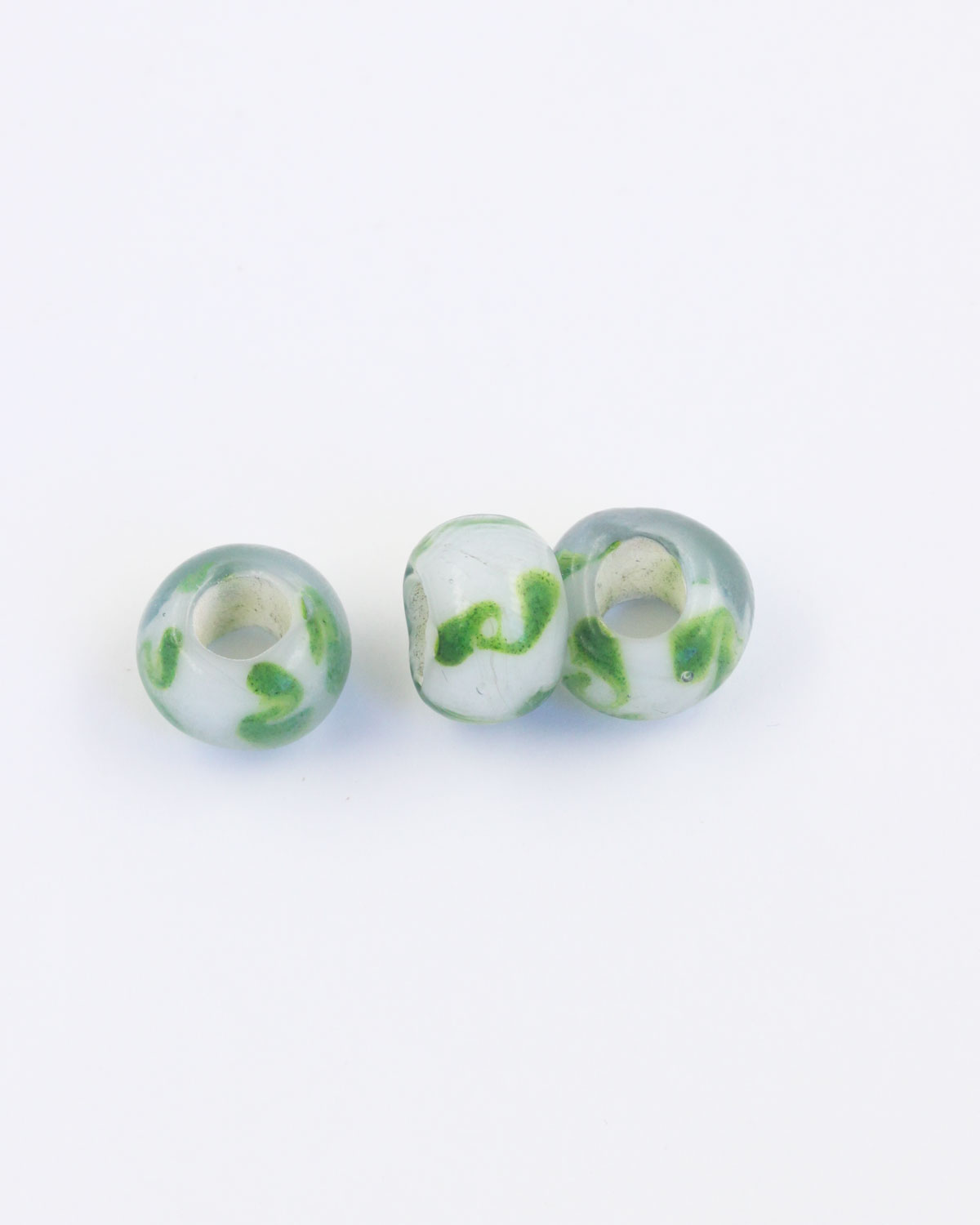 Large hole glass bead white with green swirl