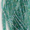 fire polished glass bead 4mm luster iris emerald