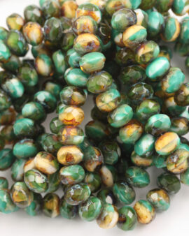 Glass rondelle 6x9mm shiny emerald and amber