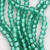 silver leaf glass bead 12mm green