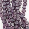 Millefiori glass disc purple white