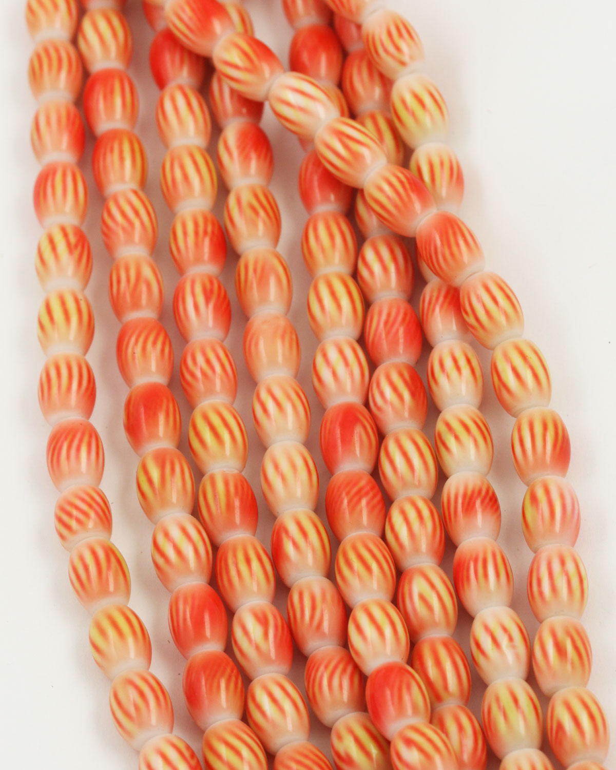 oval coated glass beads 7x10mm orange