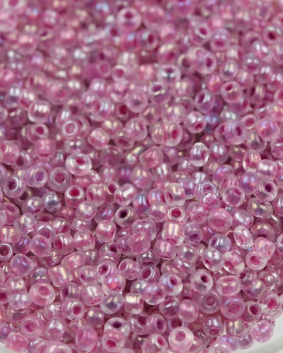 Transparent iridescent seed bead purple