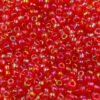Transparent iridescent seed bead red