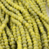 Faceted Matte Glass Rondelle 6x7mm Dirty Yellow