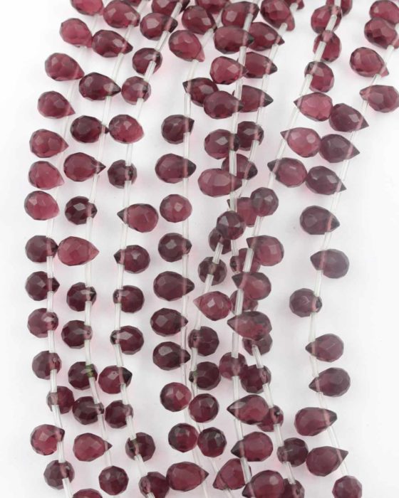 Faceted teardrop glass bead amethyst