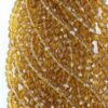Faceted round glass bead 8mm amber