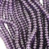 Disc Shape Glass Beads 7x11mm. Sold per strand approx 58 beads purple transparent