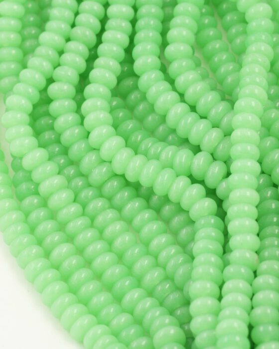 Disc Shape Glass Beads 7x11mm. Sold per strand approx 58 beads green opal