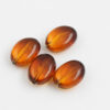 Oval resin beads 22x16mm Amber