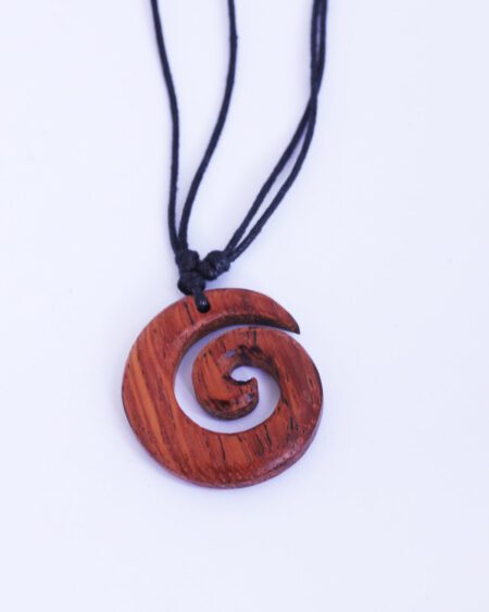 wooden koru pendant with sliding cord