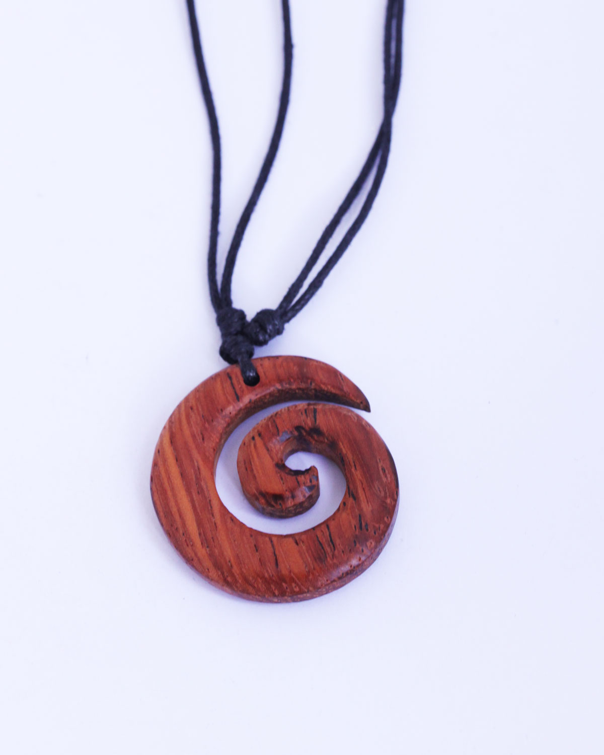 Wooden Koru Pendant. Sold individually