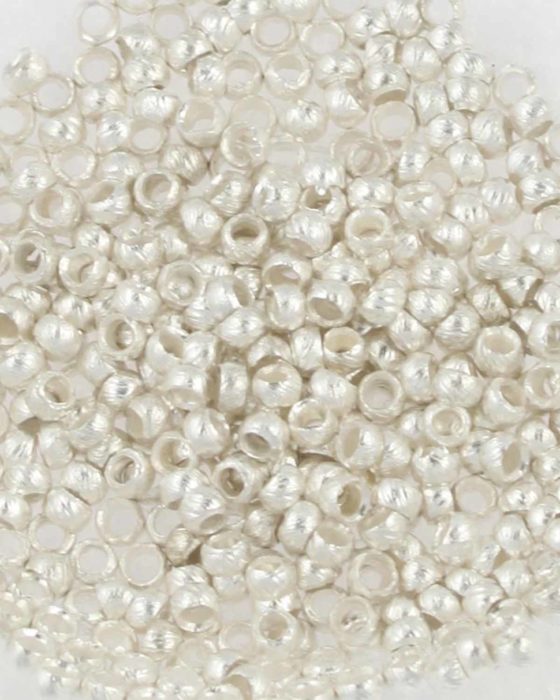 Crimp beads,1.5 x 2 mm, hole 1.75 mm. Sold per pack of 10 gm
