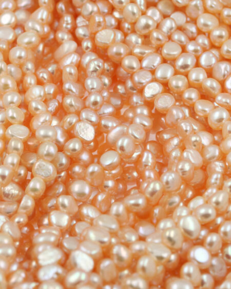 Freshwater pearls irregular shape 7-8 mm. Sold per strand approx. 60 pearls - Peach
