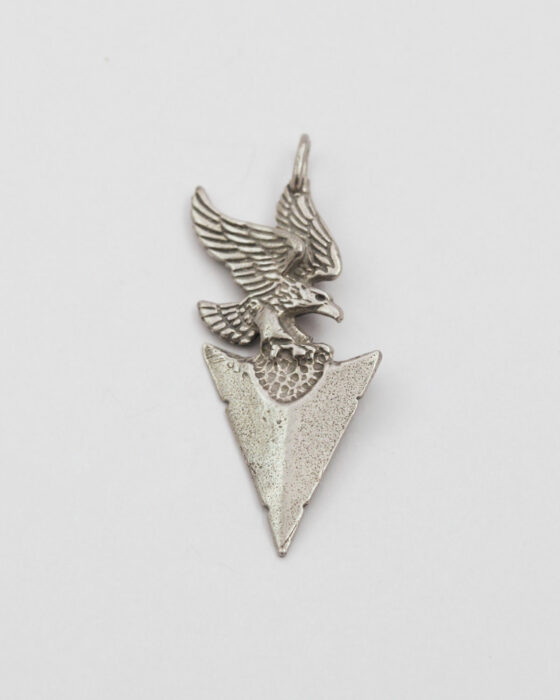 Arrow with eagle pendant