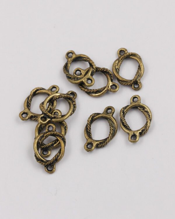 715-802 Twisted ring with cord - Antique brass