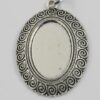 Oval bezel pendant with twirl