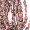 Millefiori oval glass beads Amethyst