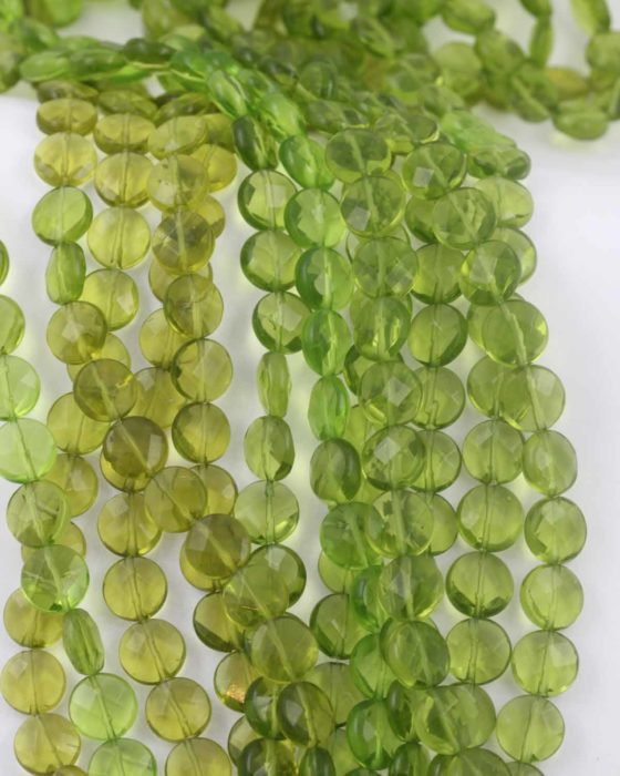 round flat faceted glass bead peridot